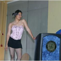 Chris Wu poses in the student center during the Mock Rally