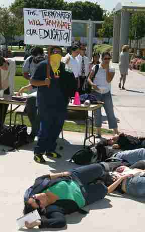 Protesters participate in a Die-in in protest against the rising price for and lack of funding for higher education.
