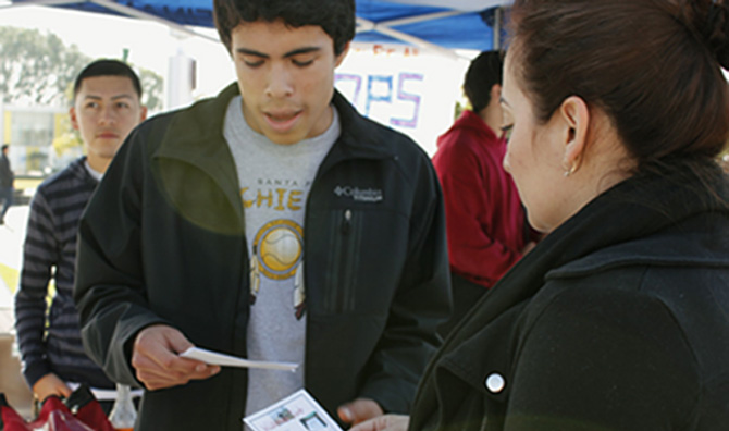 Rego Gomez from the Wilderness Club. Here Rego is helping out by passing out fliers and giving information about the club.