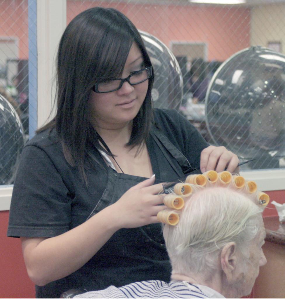 Cosmetology major Veronique Khuu attending a client at the cosmetology department. Appointments are encourage to clients before arriving to the cosmetology department; walk-in’s are welcomed upon availability.