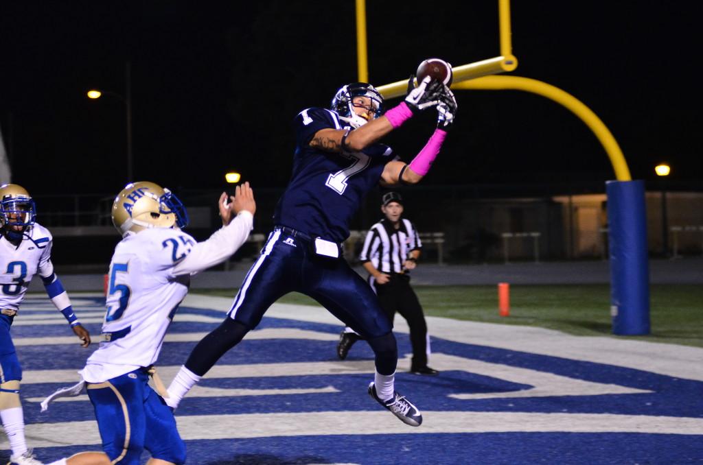Cerritos College wide receiver No. 7 Robert Abeyta makes a leaping catch in the endzone for the touchdown. The Cerritos College football team defeats Allan Hancock College, 55-25.