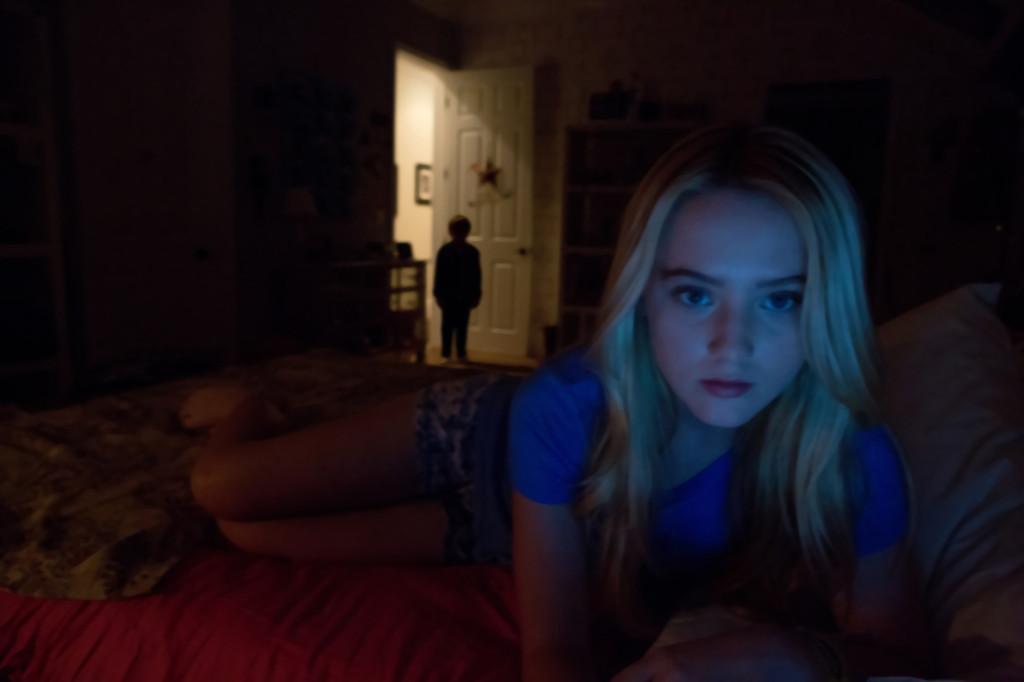 Alex played by Kathryn Newton video chats with her boyfriend Ben while her neighbor Robbie stands by her door. Paranormal Activity 4 lacked tension as in previous films.

