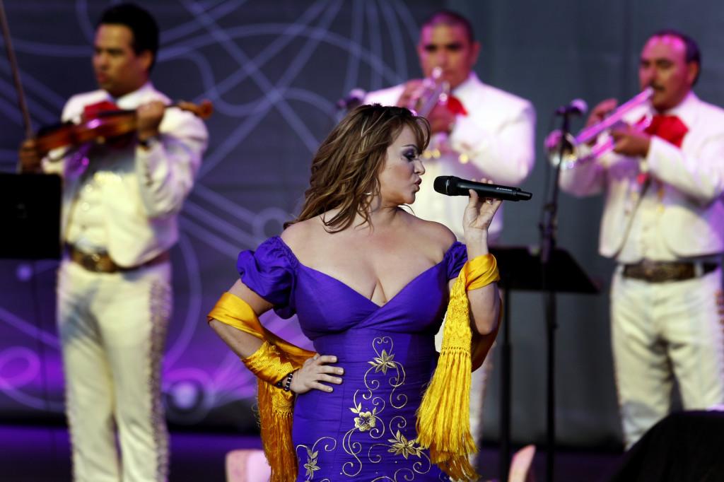 Mexican-American singer Jenni Rivera, a popular recording artist and reality television star, is feared dead after a small plane crashed early Sunday in northern Mexico. Here, Rivera, performs in Irvine, California on July 10, 2012. (Rick Loomis/Los Angeles Times/MCT)