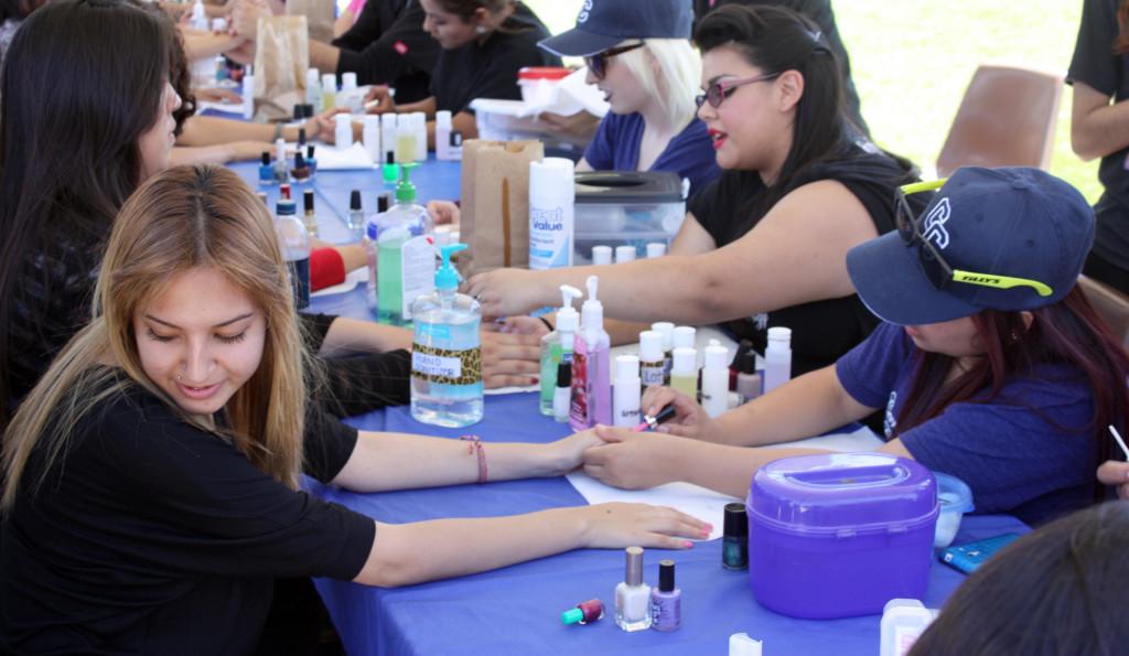 The Cosmetology Department, giving out free manicures to high school students during Senior Preview Day on Friday April 19. 