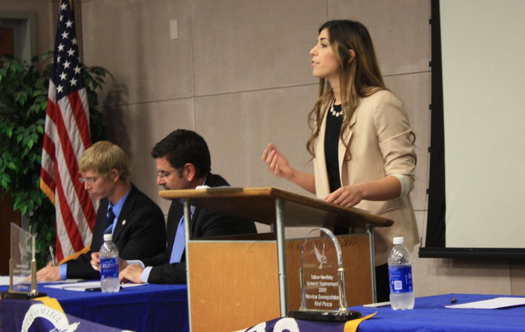 Phi Ro Pi Club vice president, Analicia Avila speaking during the facutly student debate on Thursday. Avilia was paired up with speech instructor Bill Sparks during the debate on syllabus changes.