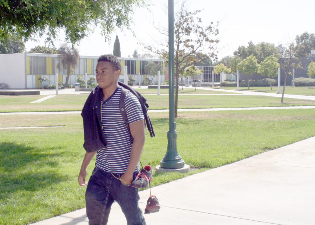 Business major Tyrece Britton walking to the student center after getting out of his Fitness and Wellness class. 