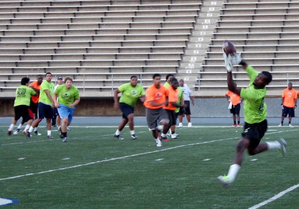 Freshman wide receiver Ricky Carrigan Jr. makes a catch during practice. Carrigan was awarded Most Valuable Player by his team last year at Cabrillo High School.