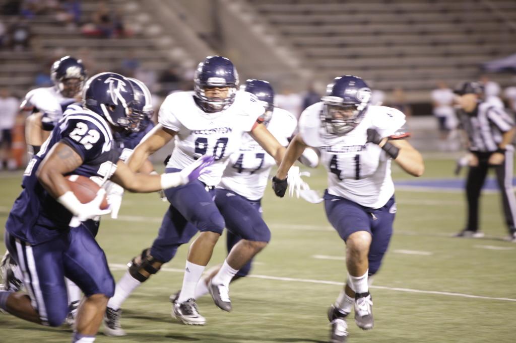 Sophomore running back Elijhaa Penny charging the opposing Fullerton College defense in a Sept. 14 match.