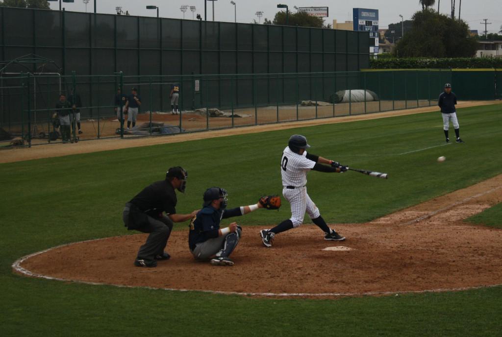 The+tight+win+against+College+of+the+Canyons+Thursday+proved+difficult+batting+wise+for+the+Falcons%2C+sopomore+infielder%2C+Jose+Ramero%2C+makes+contact+with+the+ball+and+prepares+to+run+to+first.Photo+credit%3A+Daniel+Linares