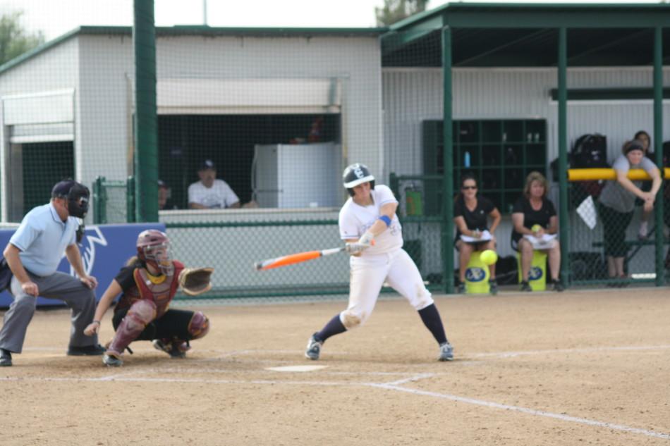 Falcons first basemen Haley Whitney connects on one of her two singles on March 11 against the Lancers. Photo credit: Mario Jimenez