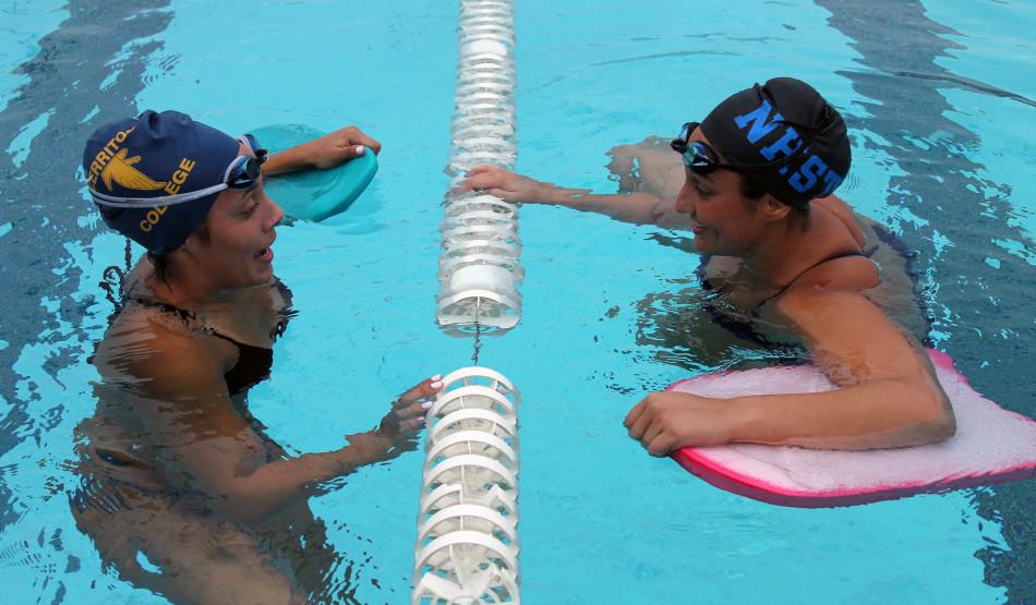 Amanda Loya (left) and Carla Harvey (right) qualified for the California Community College Athletic Association State Championships.  Loya just recently broke the Cerritos College 100 meter breaststroke record and Harvey is going for the 100 backstroke record. Photo credit: Gustavo Olguin