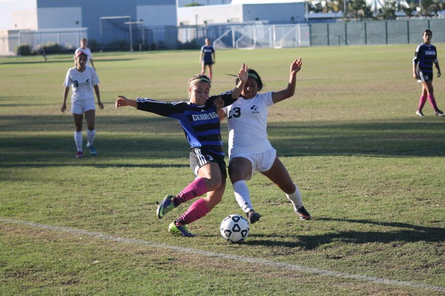 Keeping up the pressure. Ashley Anaya-Webb turns up the heat on East Los Angeles College as she attempts a tackle on the Husky defender. Cerritos College won 7-0. Photo credit: Sebastian Echeverry