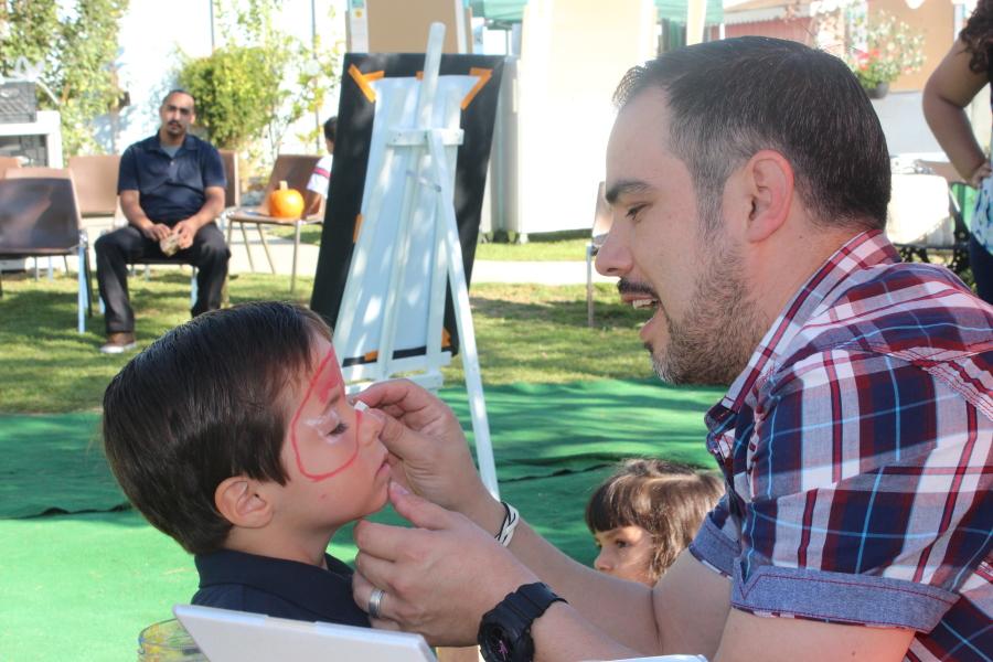 Festival of ‘harvest’: The Child Development Center hosted the Harvest Festival as a seasonal celebration for children and family. The event had activities like face painting. It’s the last event before the move to the new building in December. Photo credit: Denny Cristales