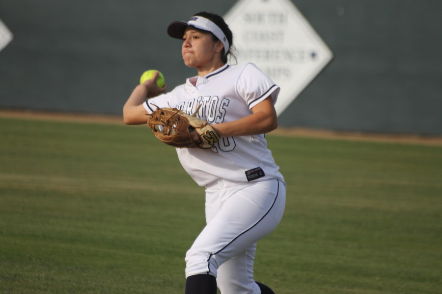 Second baseman Monique Ramirez attempts to get the out during the February 20 game against College of the Canyons. The Falcons ended their season with a 26-19 record. Photo credit: Monica Gallardo