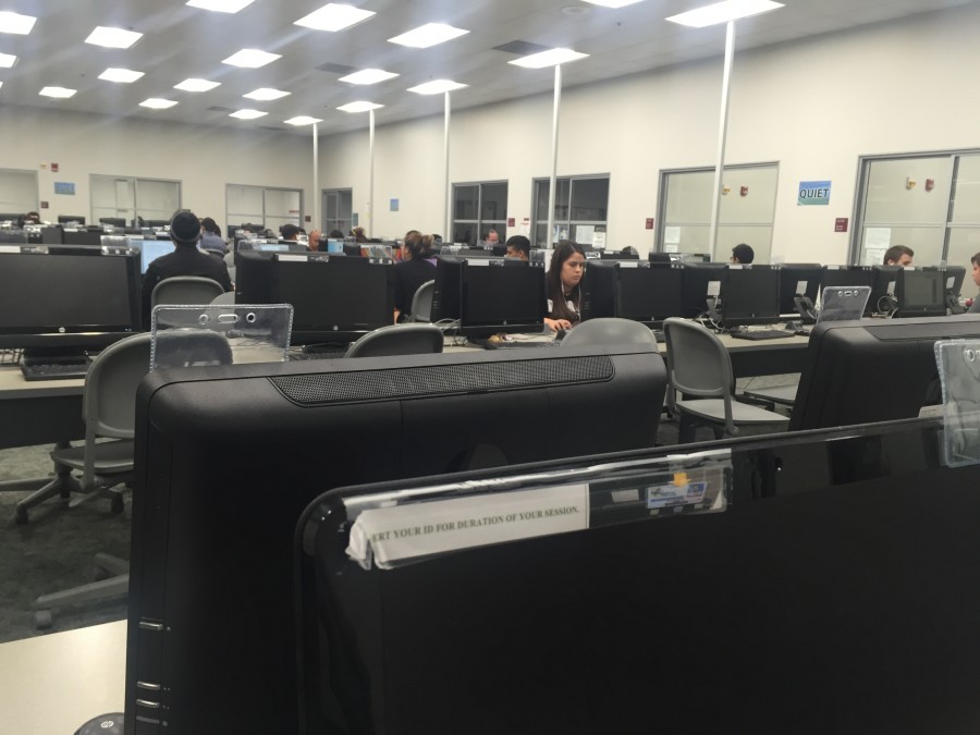 Cerritos College students usually turn to the library computer lab when they need to finish an assignment. Trustee Drayer's idea would let them rent the needed technology to complete assignments or allow them discounts to purchase said technology. Photo credit: Karla Enriquez