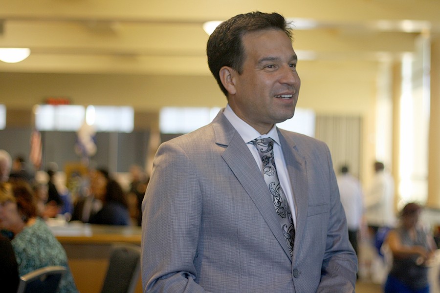 Dr. Fierro smiles on at the community welcoming event held in his honor. Dr. Fierro took office on Monday, July 6.