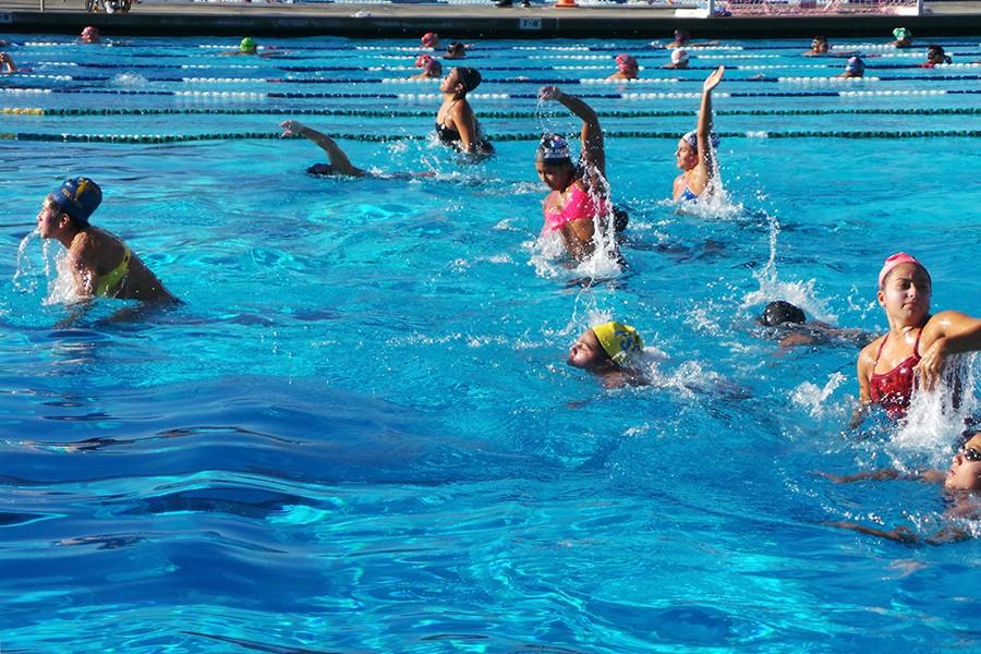 Womens+Water+Polo+team+practice%2C+from+front+to+back+Co-captain+Breanna+Zuniga%2C+Attacker+Maria+Figueroa%2C+Attacker+Jenny+Parra%2C+Co-captain+Claudia+Martinez%2C+Attacker+Lucila+Davies%2C+Attacker+Stephanie+Garcia%2C+and+Attacker+Janay+williams.+The+team+practices+left%2C+right+and+center+launches.+Photo+credit%3A+Perla+Lara