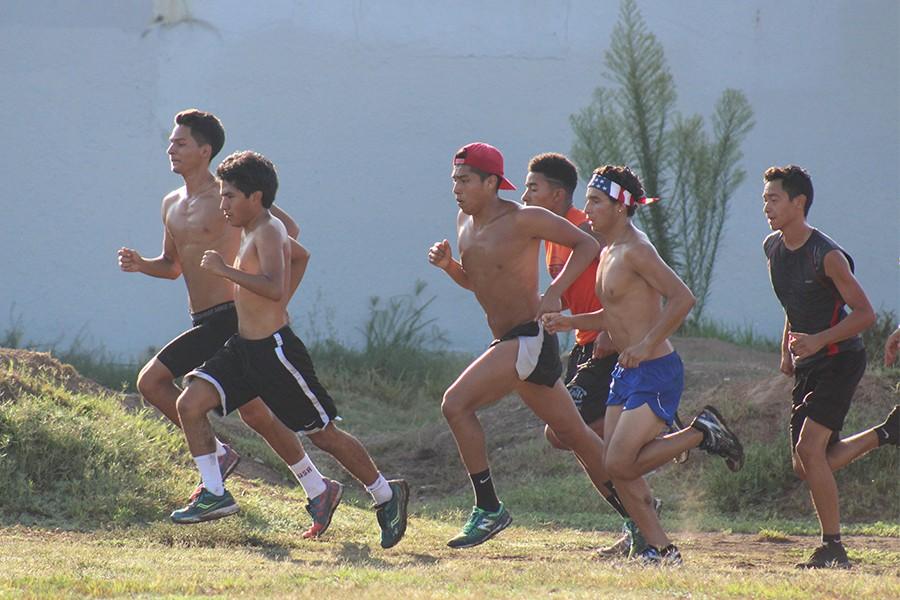 Men's cross country prepares for its first event this Saturday at Carbon Canyon Park. The team held practice last Friday at Excelsior Track Photo credit: Christian Gonzales