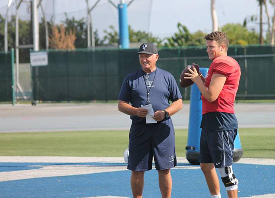 Head coach Frank Mazzotta (left) keeping a close eye on starting quarterback Jimmy Walker (right) during practice. Mazzotta on Walker, Hes a good leader, hes a pretty accurate passer, hes smart.
