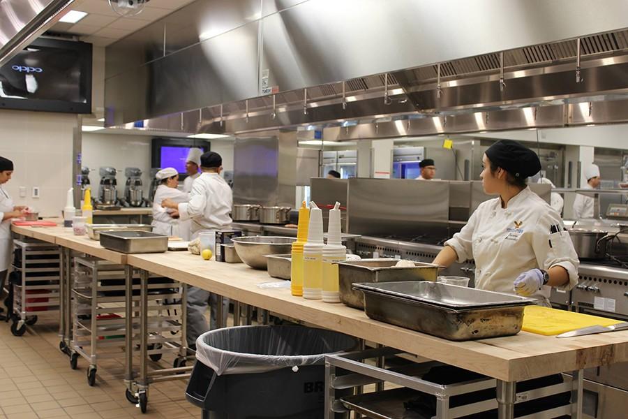 Cerritos College culinary arts students settle in to the newly renovated area. The culinary arts department will host their grand opening event on Wednesday, Oct. 7 from 4 p.m. to 6 p.m. Photo credit: Karla Enriquez