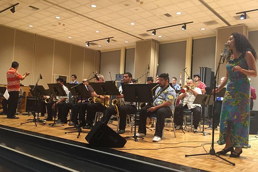 Gemma Castro (right), vocalist for the Cerritos College Jazz Ensemble sings one of the two songs she performed at the Jazz Exchange Concert. She was part of a duet along with Zineb Fikri for Poncho Sanchez' 