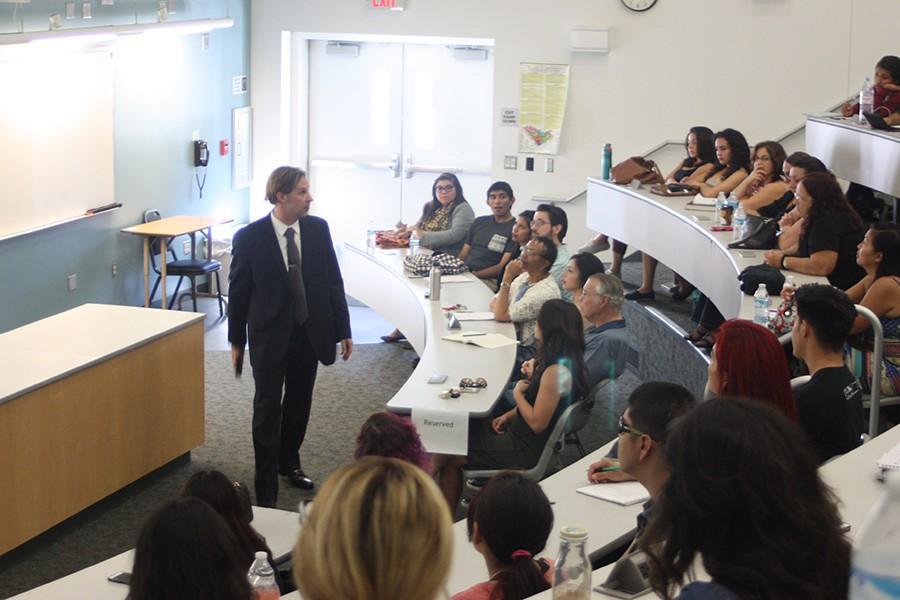 Room S201 is filled with students  as Dr. Shug gives his persecution on psychopathy and serial homicide. Approximately 90 students attended the event. Photo credit: Kristopher Carrasco