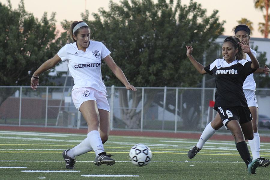 Freshman Natalie deLeon shoting the ball in the box. deLeon leads Cerritos with 20 assists of the season. Photo credit: Christian Gonzales