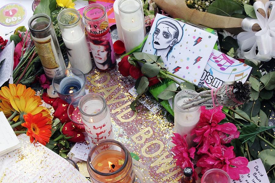 David Bowie fans leave candles, bouquets of flowers, fan art and handwritten notes on his Hollywood Star located off Hollywood Boulevard and Sycamore Street. Bowie passed away on January 10 from liver cancer. Photo credit: Bianca Salgado