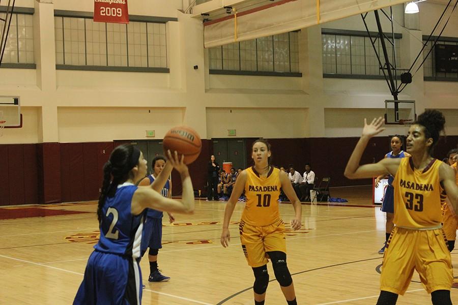 Verenice Gomez (#12) gets set to shoot a three ball over Kailyn Gideon (#33) of Pasadena City. Gomez had 13 points, eight rebounds, two assists, and two steals on the night.