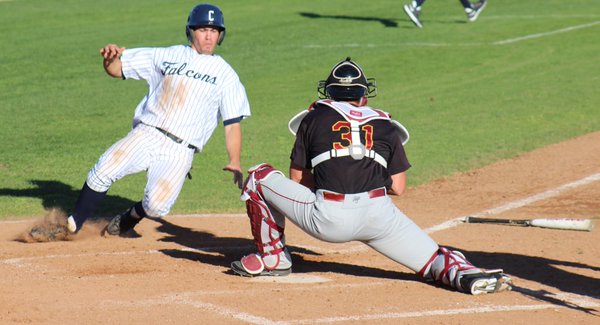 Third baseman Derrick Edwards scores on a single up the middle by center fielder Mark Pena. It was Cerritos' only points on the day. Photo credit: Christian Gonzales