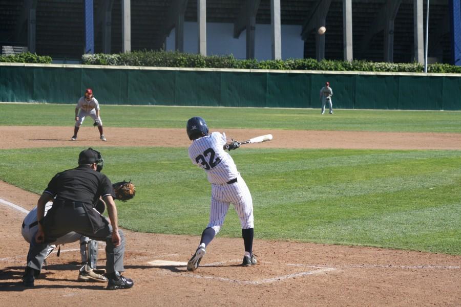 Kenton McDonald swings away and sends the ball flying out to the right field wall for a double. McDonald went 3 for 5 with a pair of doubles, three RBIs, and scored three runs. Photo credit: Taylor Ogata