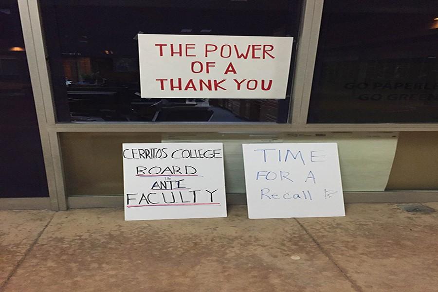Signs were left outside of the presidents office after the first board of trustees meeting of the year. Negotiations are ongoing between the board and the faculty federation. Photo credit: Ethan Ortiz