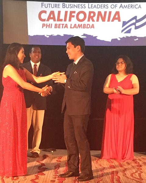 Aaron Manuel Cruz receiving first place for help desk at Phi Beta Lambda’s State Leadership Conference. The conference took place in Union City last weekend. The club won a total of nine awards. Photo credit: Karla Enriquez