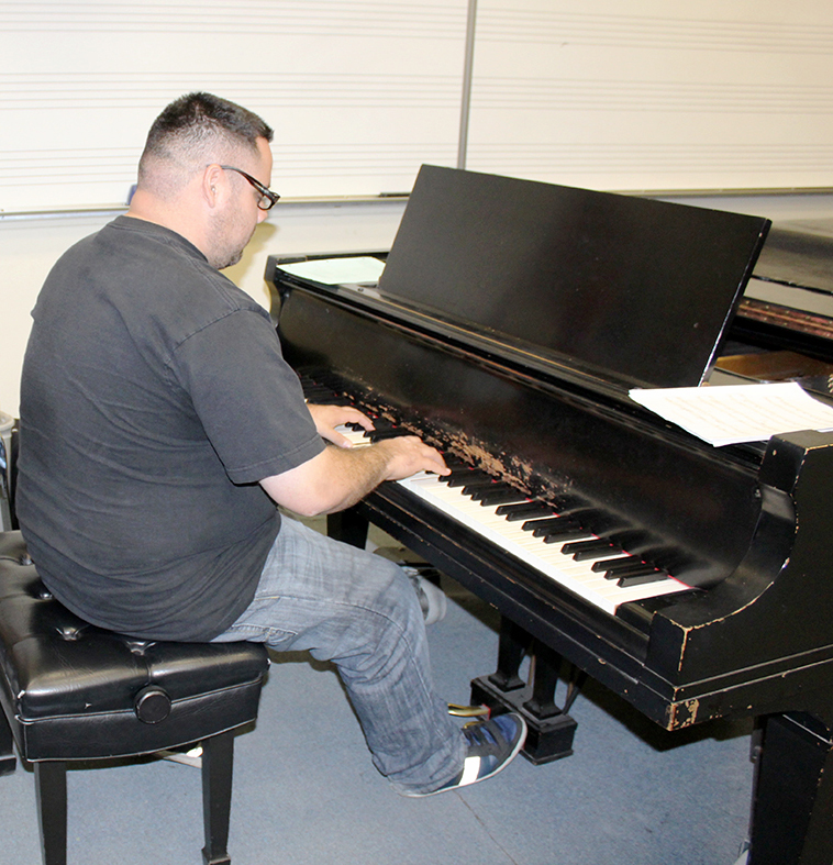 Oscar Franco, music major, practices for his recitals. The applied music program provides students with private lessons, his instructor is Professor Simmons. Photo credit: Briana Velarde