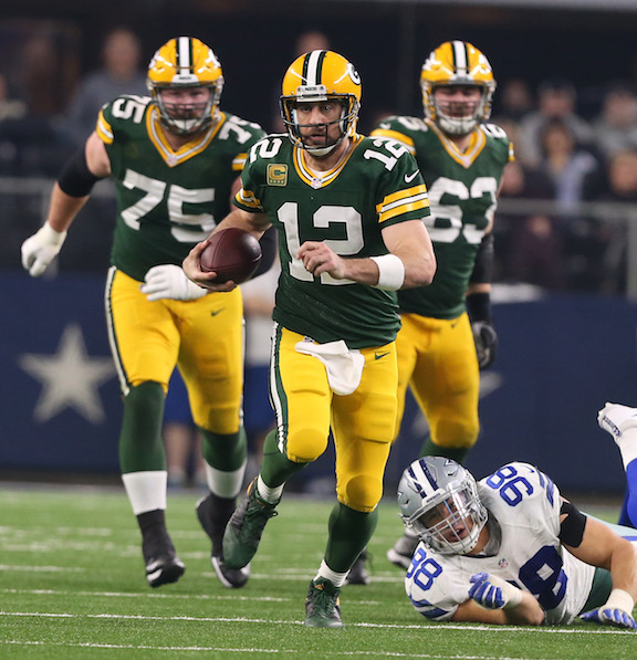 Green Bay Packers quarterback Aaron Rodgers (12) scrambles against the Dallas Cowboys in the NFL Divisional Playoff game on Sunday, Jan. 15, 2017 in AT&T Stadium in Arlington, Texas. (Richard W. Rodriguez/Fort Worth Star-Telegram/TNS)