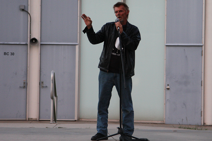 Arthur Hanney at the Take Back the Night event speaking during the open mic portion of the event on behalf of his niece who faced assault in her past. Hanney is an ASCC senator and helped out set up the event. Photo credit: David Jenkins