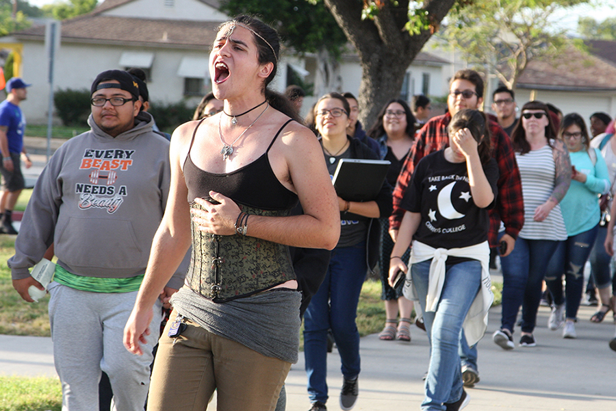 Jessica Summers leads a march around campus to start off the event “Take Back the Night” in oppsosition against sexual assault on Wednesday, April 26. Chants like “Yes means yes” and “My body my right” were said throughout out the march. Photo credit: David Jenkins