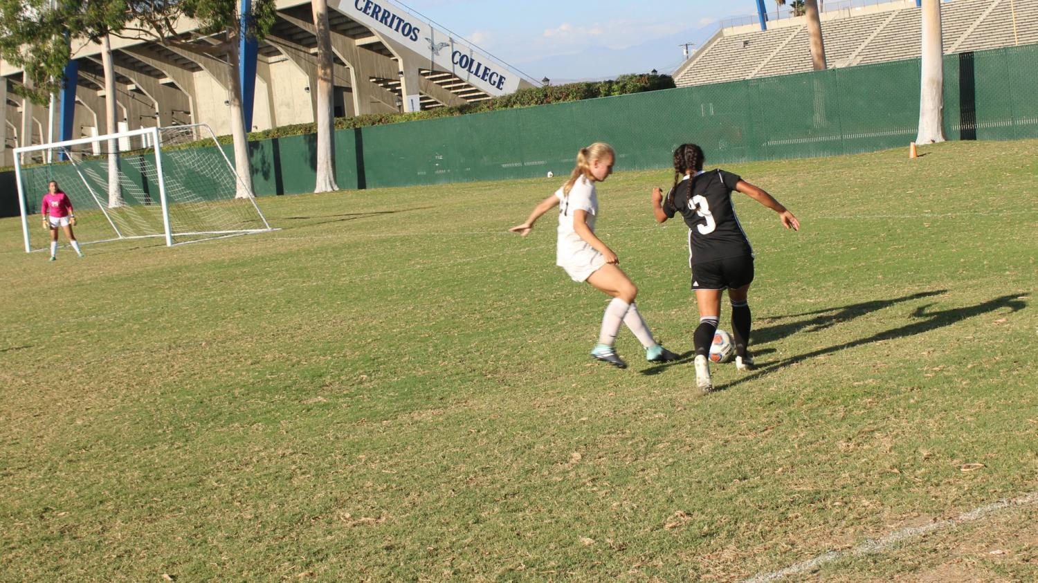 Falcon Mia Ramirez is kicking the ball towards the field. The game ended with Falcons winning 7-1. Photo credit: Nicholas Johnson
