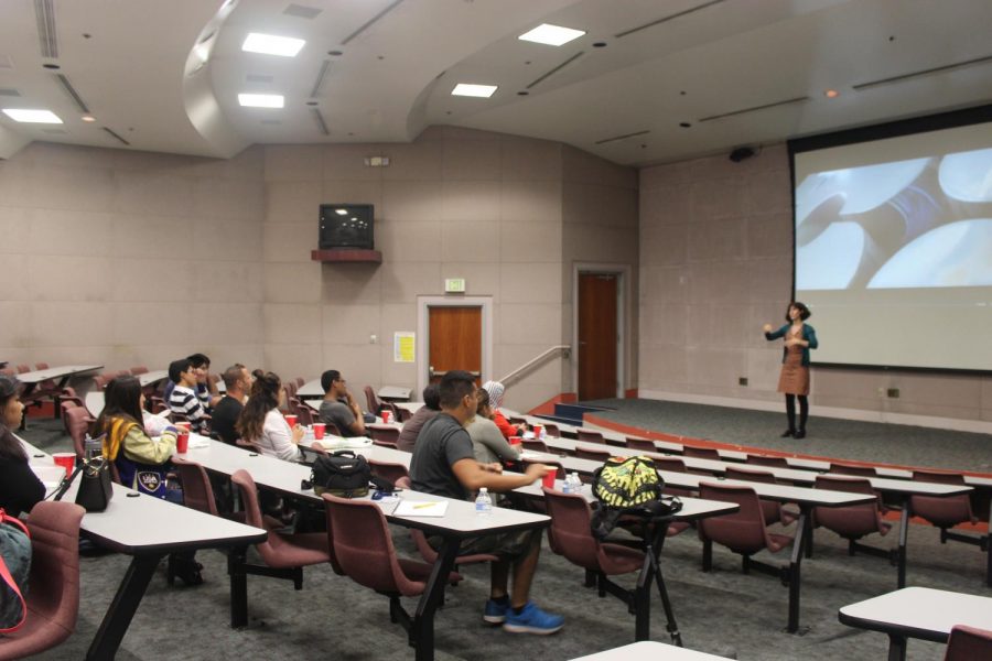Janet Danielo, event coordinator, introducing the movie to the students that attended the Popcorn and a Movie event. The movie was To Be Takei. Photo credit: Scarled Murillo