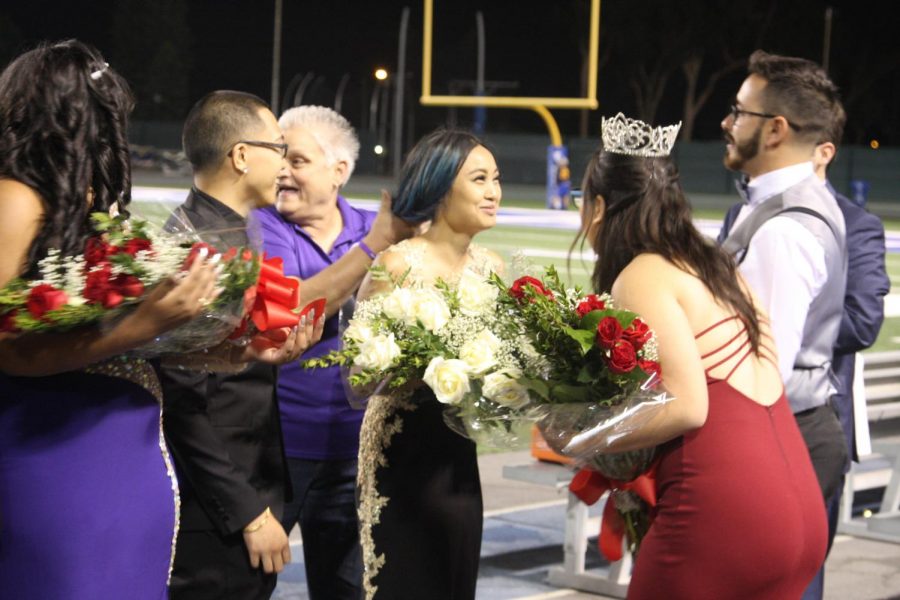 Jazmine Jose is crowned 2017 Homecoming Queen. The 2016 homecoming queen, Megan Kim, was invited back to be a part of the event. Photo credit: David Jenkins