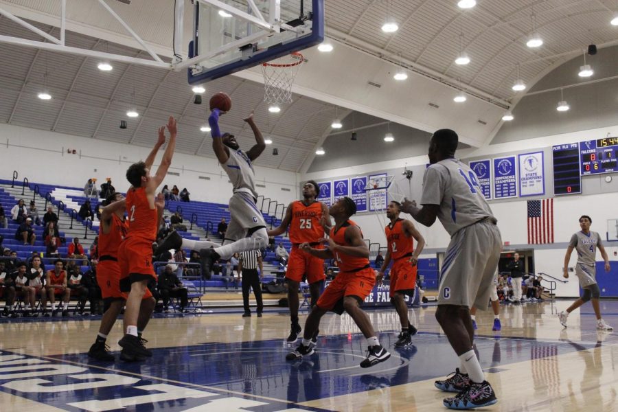 No. 1 Demetrius Thomas, the reigning South Coast Conference Player of the Year, goes hard to the basket. Thomas played 54 minutes in Friday’s game, as he totaled 25 points and 14 rebounds, for an MVP worthy showing. 