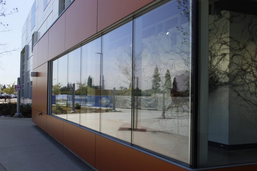 The glare on the outside exhibits windows has been an issue for Director and Curator for the Cerritos College gallery, James MacDevitt. When I showed up the day after they installed the glass ... I immediately recognized that this was not going to work, said MacDevitt.