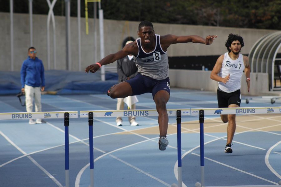 Sophomore Micqwuan Wright in the mens 400-meter hurdles race. Wright finished the race in fourth place.