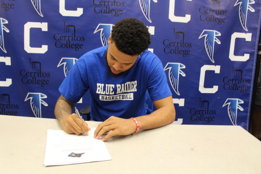 Falcons’ men’s basketball player Jason Carter inks with Lindsey Wilson University. His offer includes a two-year scholarship to play ball and an additional year to obtain his masters degree. Photo credit: Malik Smith
