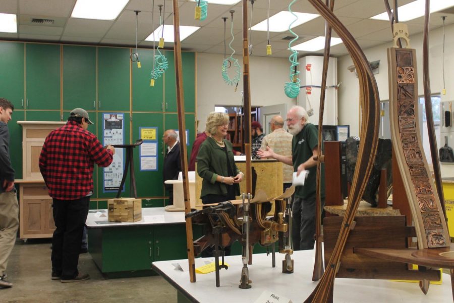 Attendees are able to view students woodwork projects. Showcased projects were created by students throughout the semester. Photo credit: Karina Quiran-Juarez