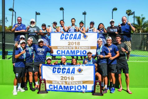 The mens and womens tennis teams hold up their respective championship banners. The mens team won their first ever Dual State Championship, while the womens team won their second title in the last three seasons.