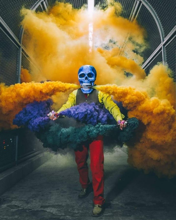 Performance artist Butch Loscin, Skeleton of Color, has been featured in Fallout Boys Hold Me Tight or Dont music video. Loscin draws inspiration from Dia de los Muertos when creating his art.
