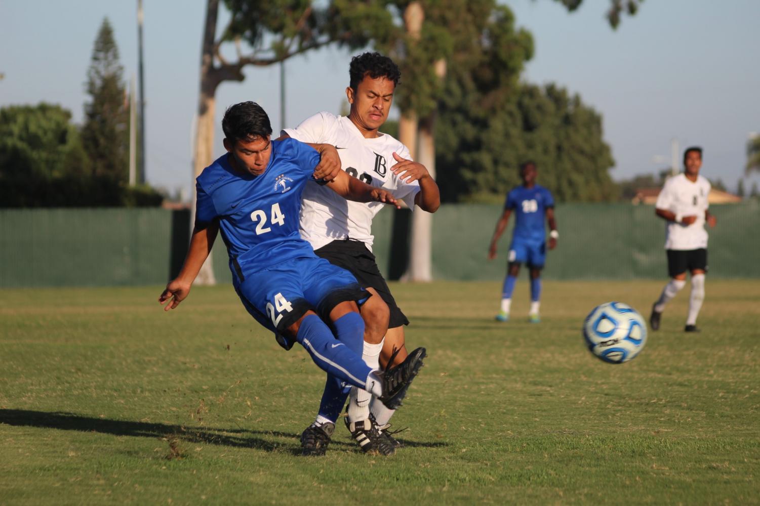Freshman midfielder No. 24 Carlos Perez crossing in the ball past the defender against Long Beach City College at Cerritos College ending in a tie on Oct. 9. 