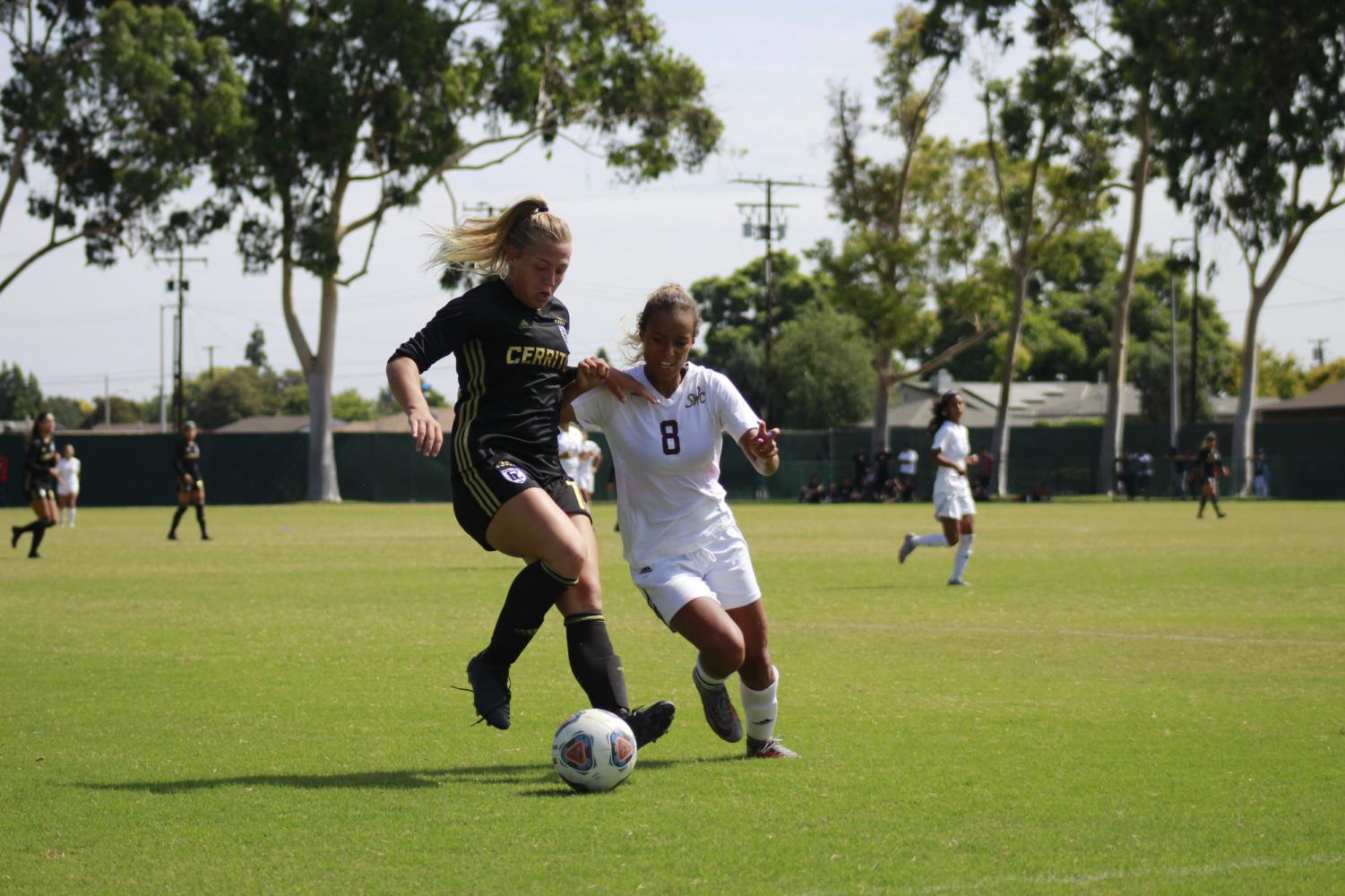 Sophomore forward No. 10 Sydney Carr shielding the ball away from one of the Southwestern College defenders. Carr had two goals and an assist in the match-up at Cerritos College against Southwestern College on Sept. 30, 2018.