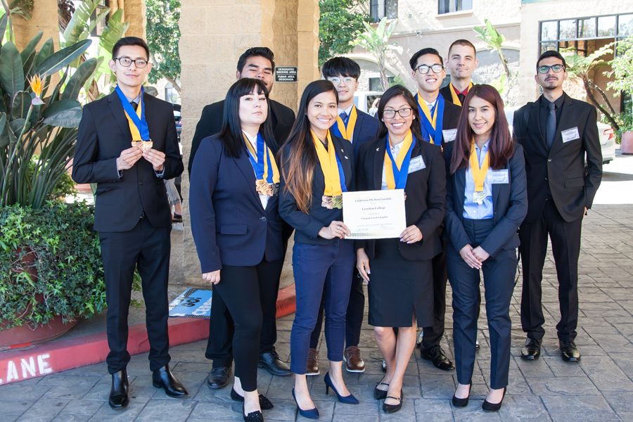 The Phi Beta Lambda club at Cerritos College walked away from the PBL State Leadership conference with 17 awards. Here they are on March 31 at the end of the conference presenting them. Photo credit: David Jenkins
